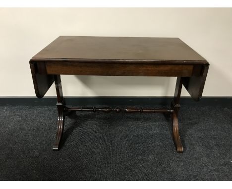 A drop leaf sofa table 