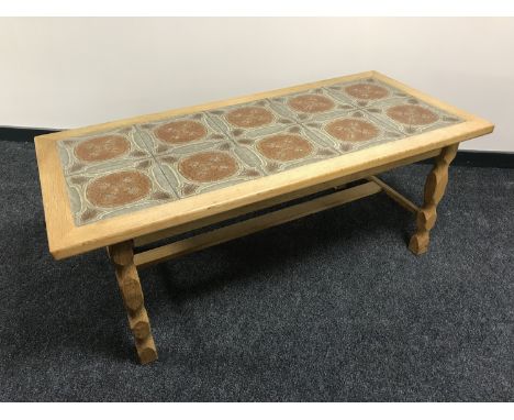 A blond oak tile top coffee table