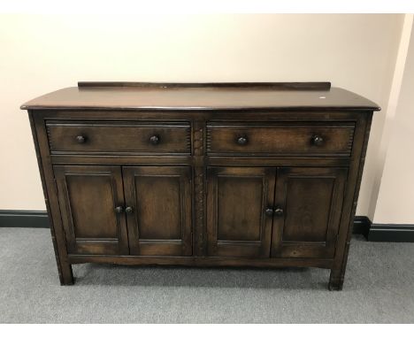 An Ercol double door sideboard 