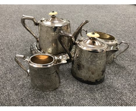 A four piece Walker & Hall Sheffield plated tea service and a china teapot stand 