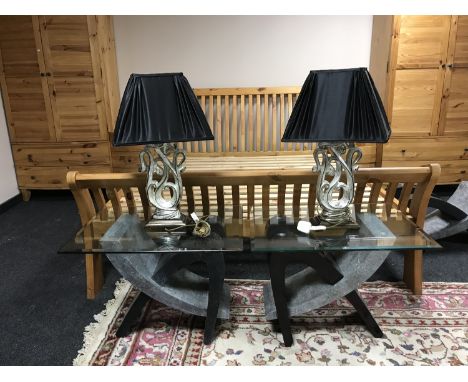 A pair of contemporary glass topped lamp tables and a pair of table lamps 