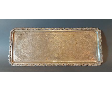 A Russian silver rectangular tray with engraved decoration, marked 84, 21ozs, 41cms x 17cms 