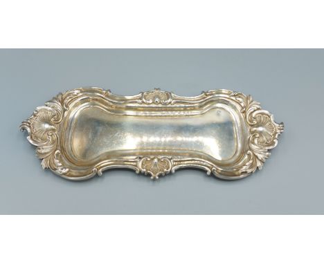 A William IV silver pen tray of shaped scroll form, Sheffield 1830, makers Samsom and Harwood, 10ozs, 29cms x11.5cms 