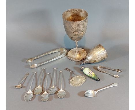 A Birmingham silver trophy cup together with other items of silver to include sugar tongs and a silver mounted scent bottle, 