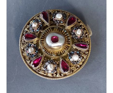 A Mother Of Pearl, Amethyst set and enamel decorated buckle of circular form, 6.5cms diameter 