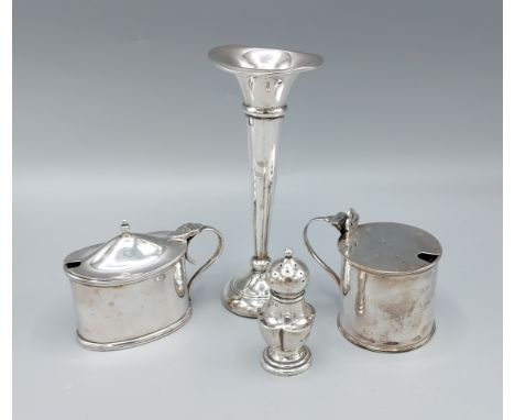 A Sheffield silver mustard together with a Birmingham silver mustard, a Birmingham silver spill vase and a Birmingham silver 