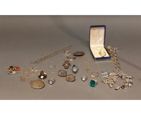 A collection of silver jewellery to include a charm bracelet together with other jewellery 