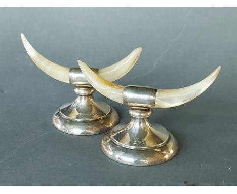 A pair of Chester silver and Mother Of Pearl knife rests 