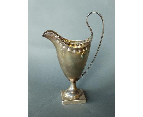 A Victorian silver pedestal jug, Birmingham 1895, 15.5cms tall 