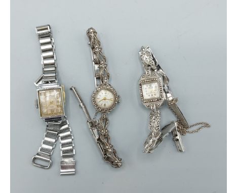 A Vidar Birmingham silver and marcasite set Ladies cocktail watch, together with two other ladies wristwatches 