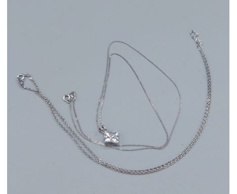 A Platinum linked chain, 2.9 grams together with a 14ct gold pendant set with a Cubic Zirconia with 14ct gold chain, 