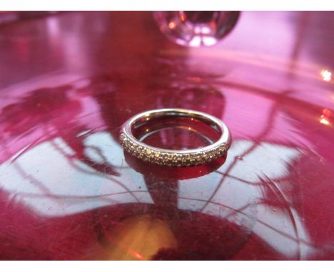 Eighteen Carat White Gold Diamond Encrusted Wedding Band
