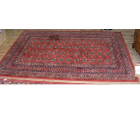 Middle Eastern style carpet with geometric border - 240cm x 170cm