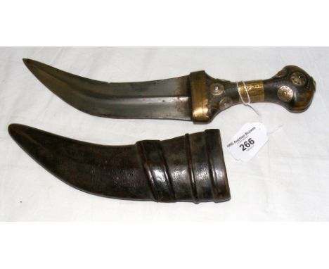 A decorative Jambiya with metal mounted handle and leather scabbard - 31cm long