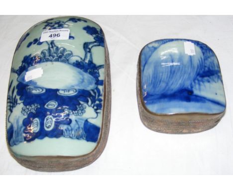 Two oriental ceramic and metal bound pillows