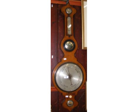 A 19th century wheel barometer/thermometer by Lelli of Newport