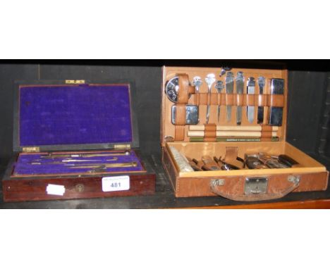 Boxed set of technical drawing instruments, together with a leather case containing tools