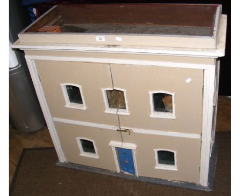 An old Georgian style doll's house with fitted interior, light fittings and small amount of furniture - 94cm wide