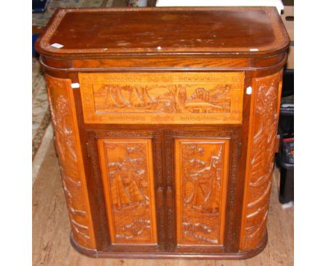 A carved oriental cocktail cabinet - 78cm wide - with fitted interior