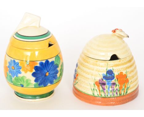 Clarice Cliff - Sungay - A Daffodil shape preserve pot and cover circa 1932, hand painted with a band of stylised flowers and