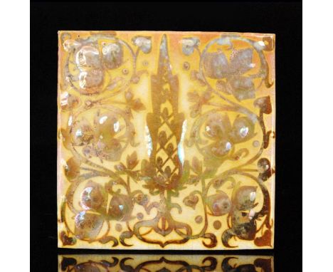 Pilkington's - A 6in plastic clay gold lustre tile decorated with a stylised trailing motif amidst a foliate ground, all to a