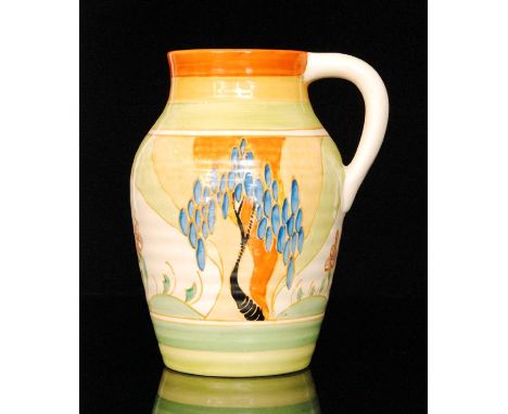 Clarice Cliff - Windbells - A single handled Isis jug circa 1933, hand painted with a stylised tree landscape with orange, ye