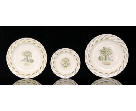Eric Ravilious - Wedgwood - Garden - Three graduated plates comprising one larger dinner plate decorated with a roundel of a 
