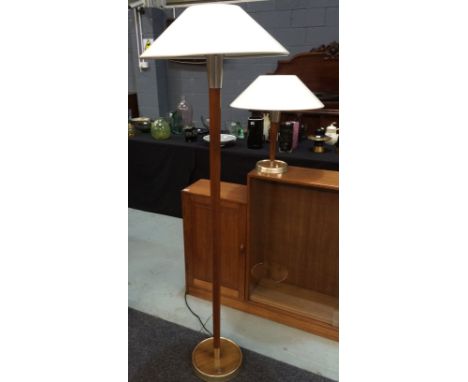 Merchant Adventurers - A teak and metal mounted standard lamp with white conical metal shade, height 155cm, together with a s