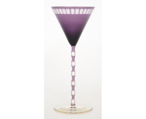 Otto Prutscher - Meyr's Neffe - A stemmed wine glass circa 1906 with a circular spread foot below an amethyst cased and ladde