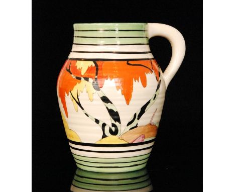 Clarice Cliff - Honolulu - A small single handled Lotus jug circa 1933, hand painted with a stylised tree landscape between g