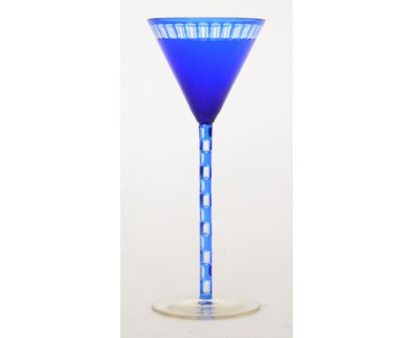 Otto Prutscher - Meyr's Neffe - A stemmed wine glass circa 1906 with a circular spread foot below a blue cased and ladder cut