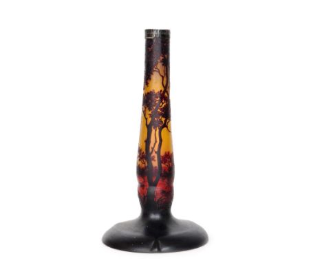 Daum - A large early 20th Century cameo glass lamp base with a wide domed foot rising to a slender inverted baluster column, 