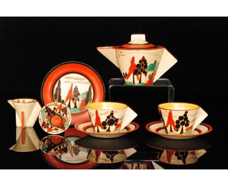 Clarice Cliff - Red Trees & House - A conical early morning breakfast service circa 1929, comprising teapot, cream, sugar, tw