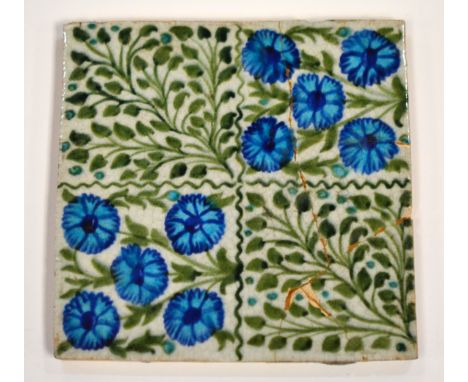 William de Morgan - Chelsea - Bedford Park Anemone - A 6in plastic clay tile decorated with blue flowers and foliage, impress