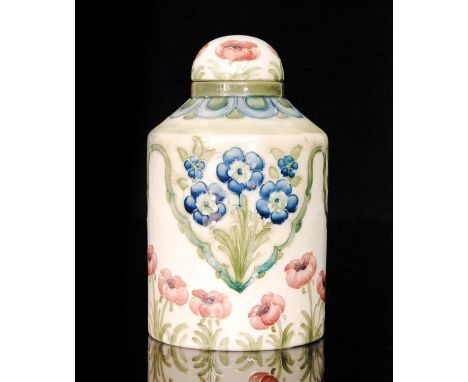 William Moorcroft - Rose and Forget-me-not - An early 20th Century tea canister with domed cover decorated with tubelined flo