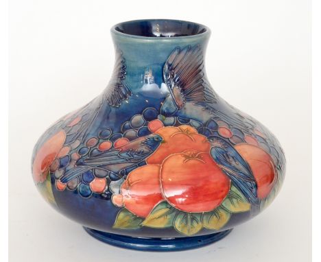 Sally Tuffin - Moorcroft Pottery - Finches - A large vase of compressed form decorated with tubelined birds pecking at fruit 