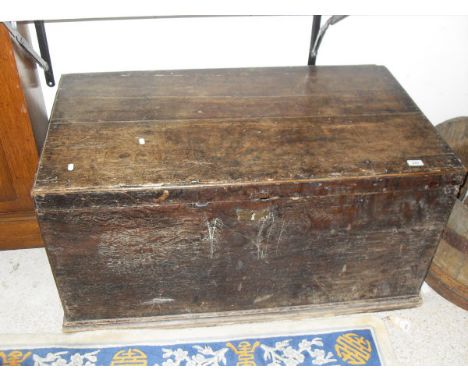 A 19th Century oak trunk with brass escutcheon, raised on a plinth base CONDITION REPORTS Looks like a period chest with vari