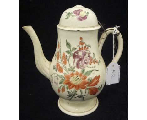 An 18th Century Leeds cream ware baluster shaped chocolate pot and lid with floral spray painted decoration raised on a circu