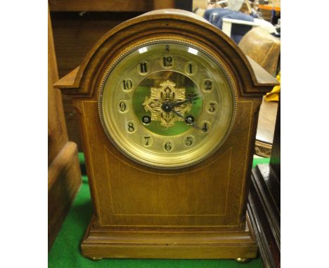 An Edwardian mahogany and inlaid cased dome top mantle clock, the movement by J Marti of Paris, together with a pierced brass