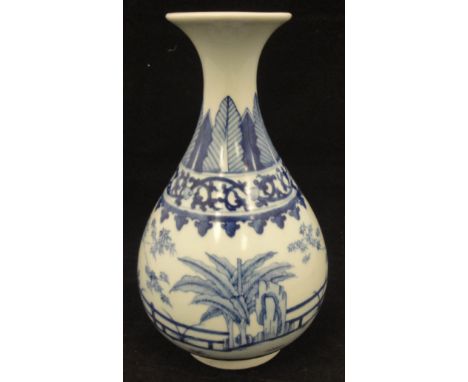 A Chinese blue and white gourd shaped vase decorated with garden and fence pattern, bearing six character  Guangxu mark to ba