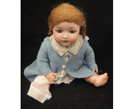 An Armand Marseille Bisque headed doll with composition body, arms and legs, the head with sleep eyes and open mouth, inscrib