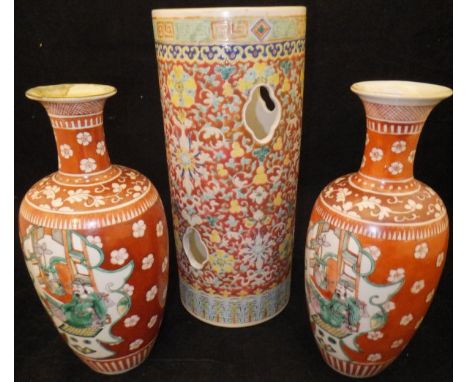 A Chinese famille-rose and pierced cylindrical hat stand vase with all-over floral and foliate decoration, bearing seal mark 