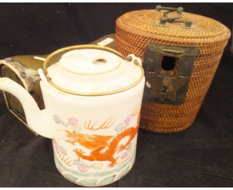 A Chinese porcelain cylindrical teapot with five toed dragon decoration, housed in a basket case, with brass mounts, a famill