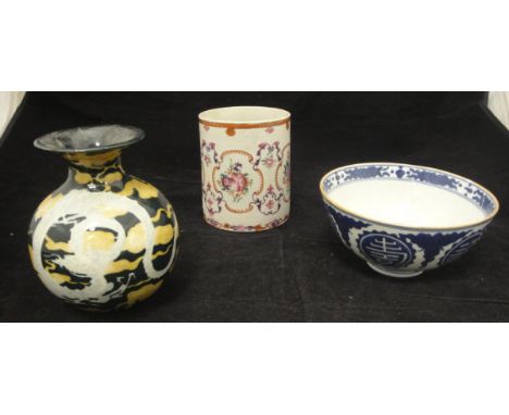 A Chinese Ming style blue and white bowl. the brown glazed rim over medallion decorated sides and decorative centre medallion