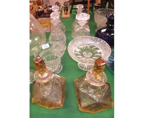 A pair of early 20th Century Art Deco style decanters with cut and amber flash decoration, together with a set of three Georg