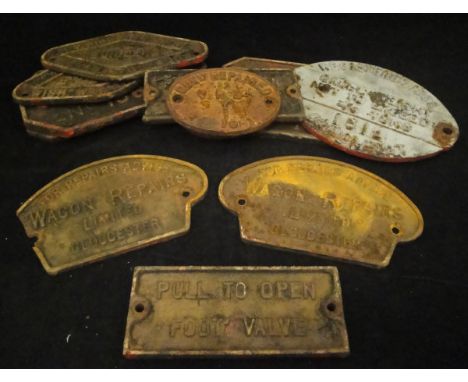 A collection of cast iron wagon plates, various, including "For repairs, advise Wagon Repairs Limited, Gloucester" x 2, "Pull