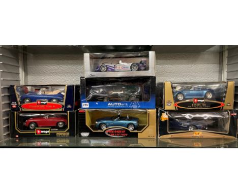 SEVEN 1:18 SCALE MODELS OF PORSCHES AND BMWS AND A LOTUS ESPRIT