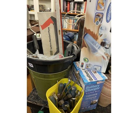 TWO BUCKETS OF VARIOUS DOUBLE ENDED SPANNERS AND TWO BUCKETS OF TOOLS INCLUDING A BATTERY CHARGER