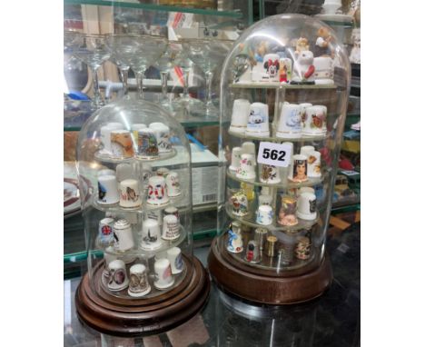 TWO DOMES OF VARIOUS NOVELTY THIMBLES INCLUDING METAL AND ENAMEL EXAMPLES, CHERISHED TEDDIES, ETC