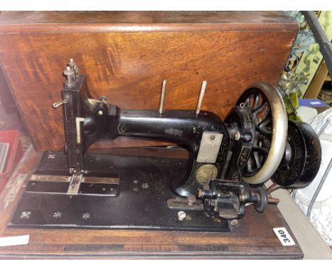 VINTAGE MANUAL SEWING MACHINE IN WALNUT CASE